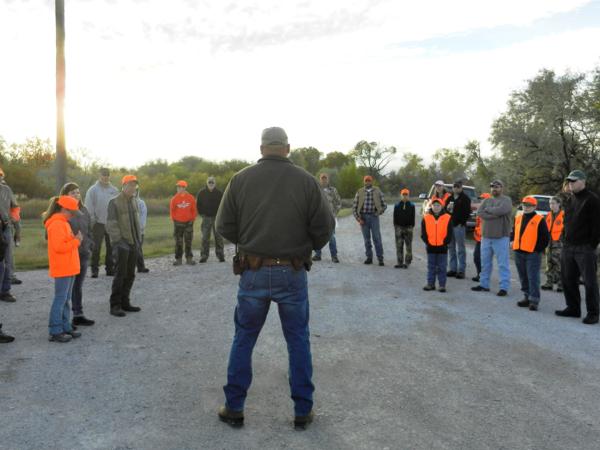 Justin Feddes, the Townsend area game warden talks to youths before their 2015 Headwaters youth hunt